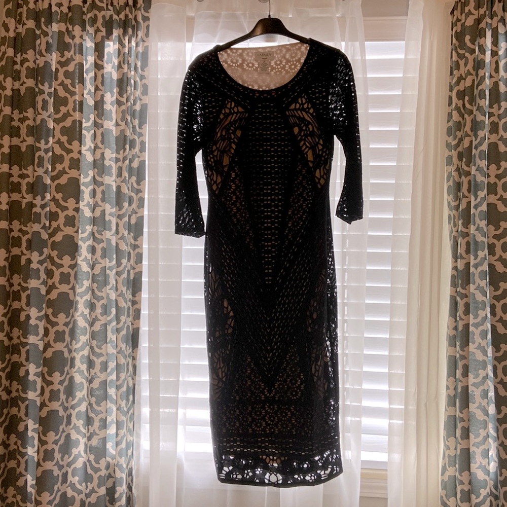 Black and nude colored pencil dress.